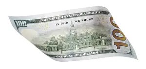 Studio Shot Image Stampe: One hundred dollar bill falling or floating on empty background