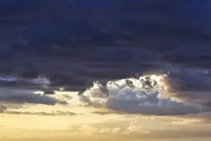 Scandinavian Evening Mood Stampe: Dramatic cloud sky at sunset, blue and yellow