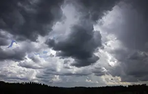 Cloud Formations In Austria Stampe: Dramatic cloudscape with (cumulus) clouds