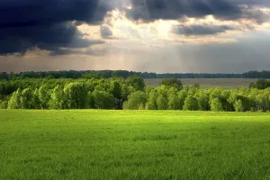 Overcast Sky Photography Stampe: Dramatic cloudscape over village landscape