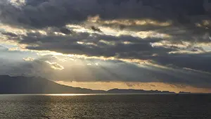 Southeast Europe Landscapes Stampe: Dramatic cloudy evening sky, sun rays breaking through clouds