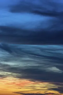 Backlit Cloud Formations Stampe: Dramatic dark clouds in the evening sky