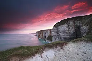 Western Europe Ocean Views Stampe: Dramatic fire sunrise over cliffs in ocean