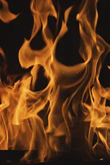 Dark Background Flames Stampe: Dramatic flames against A dark background