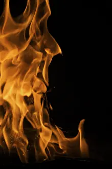 Dark Background Flames Stampe: Dramatic flames against A dark background