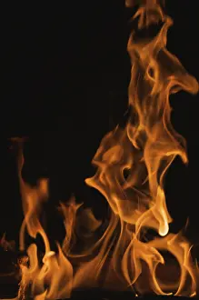 Dark Background Flames Stampe: Dramatic flames against A dark background