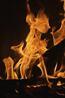 Dark Background Flames Stampe: Dramatic flames against A dark background