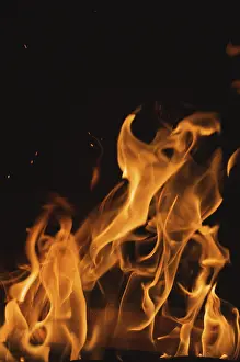 Dark Background Flames Stampe: Dramatic flames against A dark background