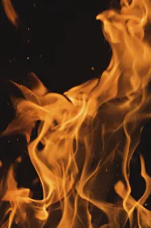 Dark Background Flames Stampe: Dramatic flames against A dark background