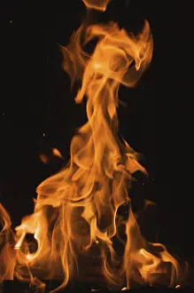 Dark Background Flames Stampe: Dramatic flames against A dark background