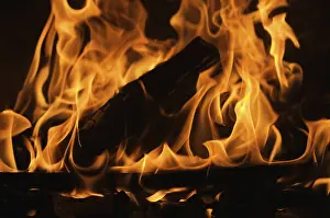 Dark Background Flames Stampe: Dramatic flames against A dark background