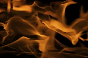 Dark Background Flames Stampe: Dramatic flames against A dark background
