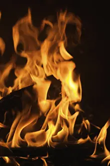 Dark Background Flames Stampe: Dramatic flames against A dark background