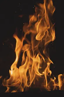 Dark Background Flames Stampe: Dramatic flames against A dark background