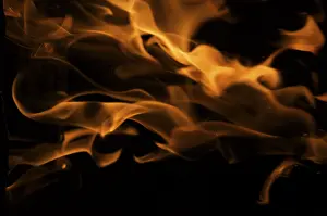 Dark Background Flames Stampe: Dramatic flames against A dark background
