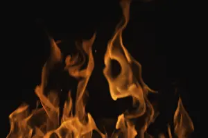 Dark Background Flames Stampe: Dramatic flames against A dark background