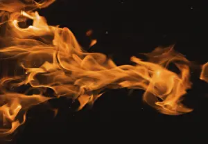 Dark Background Flames Stampe: Dramatic flames against A dark background
