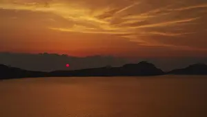 Peloponnese Landscape Photography Stampe: A dramatic red sunset, the landscape appears in backlight