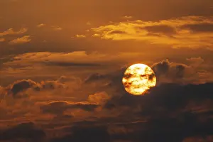Overcast Sky Landscape Stampe: Dramatic sunset with clouds and sun
