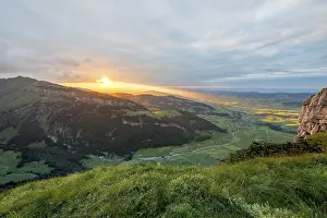 Deserted Mountain Range Europe Stampe: Dramatic sunset with cloudy skies in the mountains on the Alpsigel in Alpstein