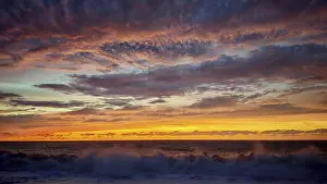 Cape Verde Sunset Stampe: Dramatic sunset with powerful cloud formations and breaking waves in the foreground