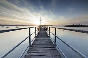 Evening Sun German Landscape Stampe: A dramatic sunset seen from a pier