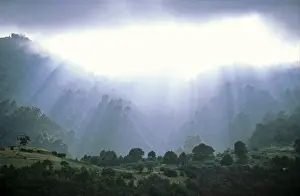 Mountain Range Landscapes Stampe: Dramatically lighted clouds after a thunderstorm