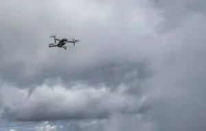 Upper Bavaria Aerial View Stampe: Drone with camera flies in front of clouds