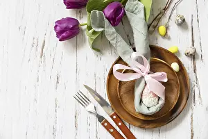 Easter Table Setting Stampe: Easter table setting with painted eggs