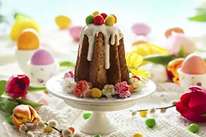Colorful Easter Eggs Stampe: Easter table setting with spring flowers
