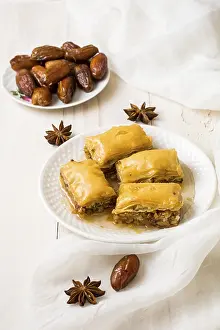 Traditional Arabic Sweets Stampe: Eastern sweets with dates fruit table