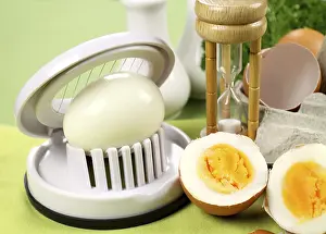 Boiled Eggs Stampe: Egg slicer with boiled eggs and an egg timer