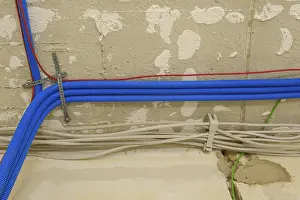 Construction Work In Germany Stampe: Electric cables and conduits under the ceiling