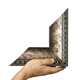 Isolated Picture Frame Stampe: Element of the frame in hand isolated on a white background