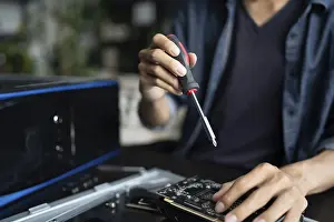 Electronic Repair Shop Stampe: IT Engineer installing Hardware Equipment Development Facility Engineer Maintenance computer Motherboard Electronic