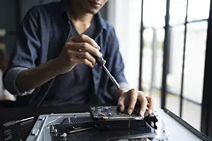 Electronic Repair Shop Stampe: IT Engineer installing Hardware Equipment Development Facility Engineer Maintenance computer Motherboard Electronic