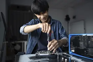 Electronic Repair Shop Stampe: IT Engineer installing Hardware Equipment Development Facility Engineer Maintenance computer Motherboard Electronic