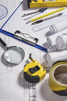 Magnifying Glass Image Stampe: Engineer tools on blueprint