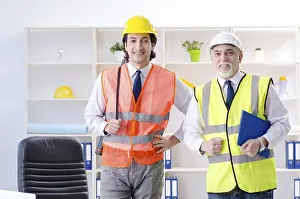 One Person Working Stampe: Two engineers colleagues working under project