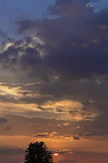 Southern Germany Sunset Stampe: Evening clouds with setting sun