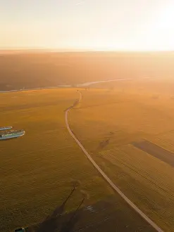 Agricultural Fields Germany Stampe: Extensive fields in the light of the sunset