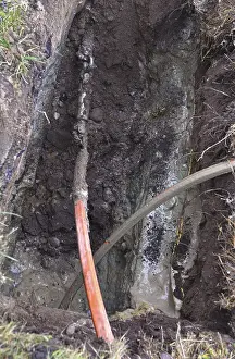 Digital Data Transmission Stampe: Fibre optic cable is pulled through the ground by a drill head