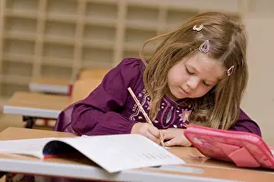 Elementary School Child Stampe: Firstgrader during a lesson