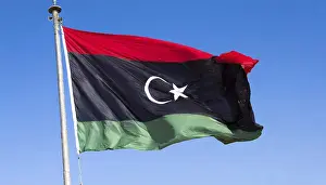 Digital Composing Of A Flag Stampe: The flag of Libya, fluttering in the wind