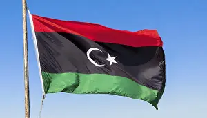 Blue Sky Background Image Stampe: The flag of Libya, fluttering in the wind