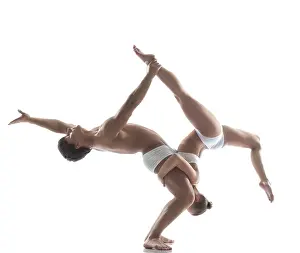 Circus Artist Performance Stampe: Two flexible acrobats posing in studio
