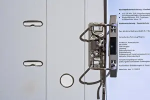 Home Office Setup Stampe: Folder with insurance document, top view