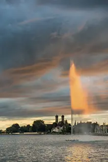 Friedrichshafen Waterfront Scene Stampe: Fountain and thunderclouds at sunset