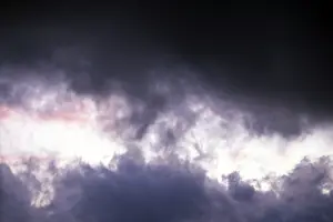 Cloudy Mood Landscape Stampe: Gap in a dark cloud formation