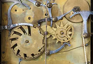 Clockwork Mechanism Stampe: Gears and cogs in the clockwork of a historical pendulum clock